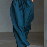 Navy Cross Halter Wide-Leg Jumpsuit With Side Pockets